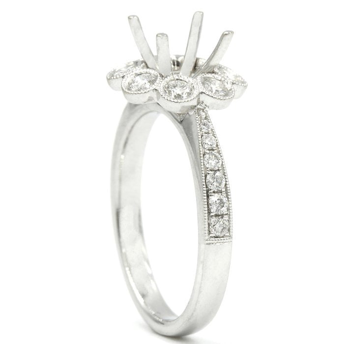 0.58ctw Diamond Flower Halo Engagement Ring