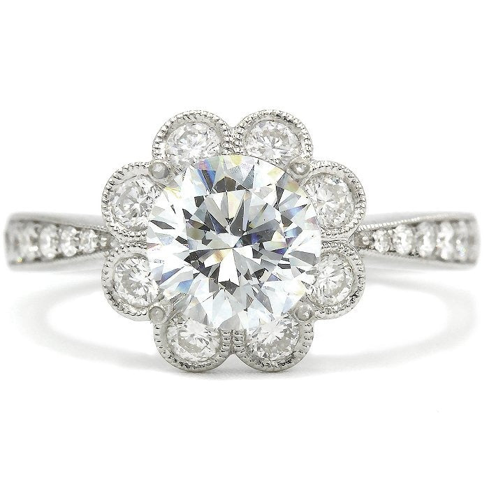 0.58ctw Diamond Flower Halo Engagement Ring